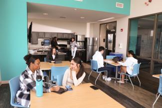 students sitting at tables