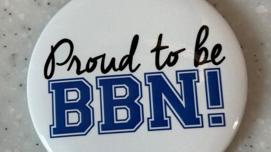 Round button that says "Proud to be BBN!"